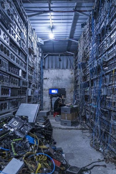 Expansive mining farm with rows of mining machines optimized for cryptocurrency extraction